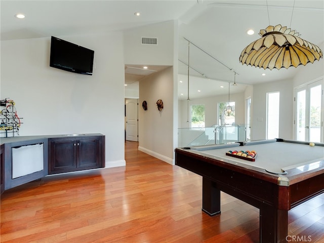 recreation room featuring pool table, light hardwood / wood-style floors, and plenty of natural light