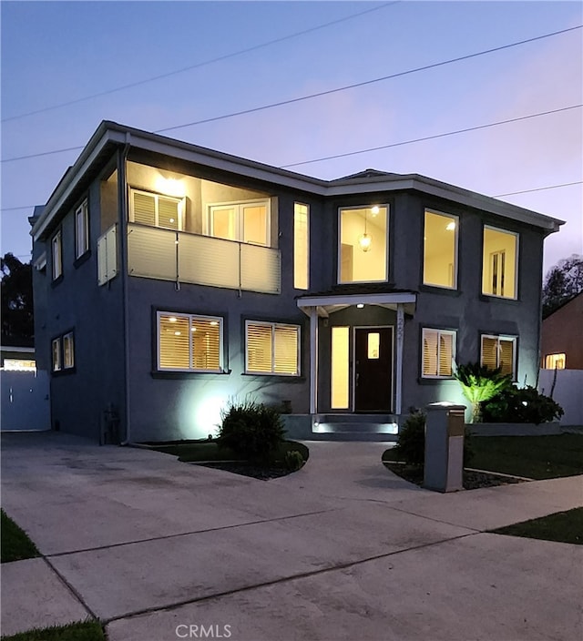 contemporary home with a balcony