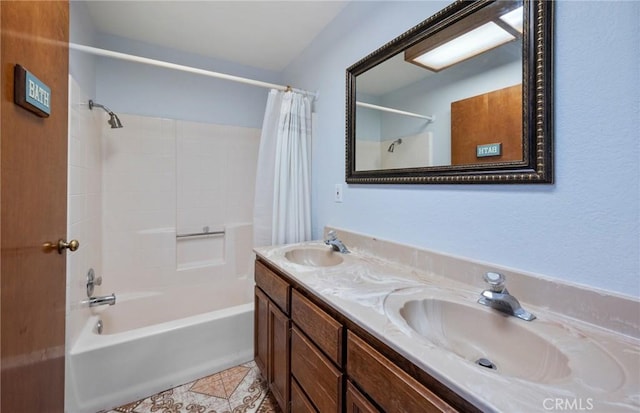 bathroom featuring double vanity, shower / bath combination with curtain, tile patterned flooring, and a sink