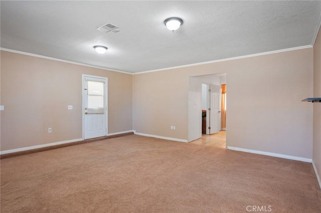 carpeted empty room with a textured ceiling and ornamental molding