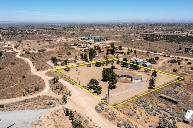 bird's eye view with a desert view