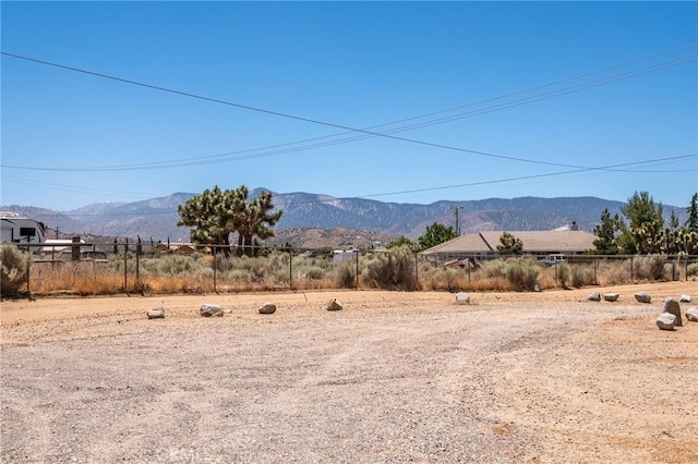 property view of mountains featuring a rural view