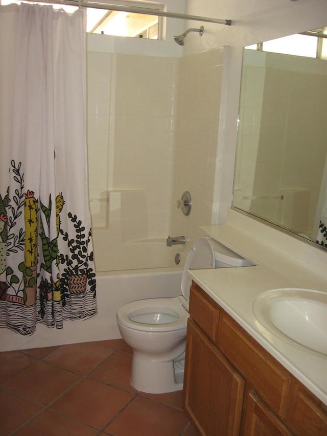 full bathroom with vanity, shower / tub combo, toilet, and tile patterned floors