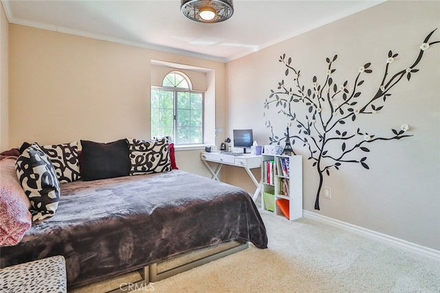 carpeted bedroom with ornamental molding