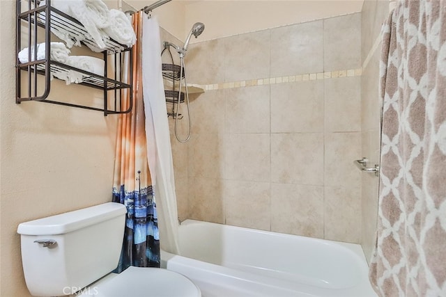 bathroom with toilet and shower / bath combination with curtain