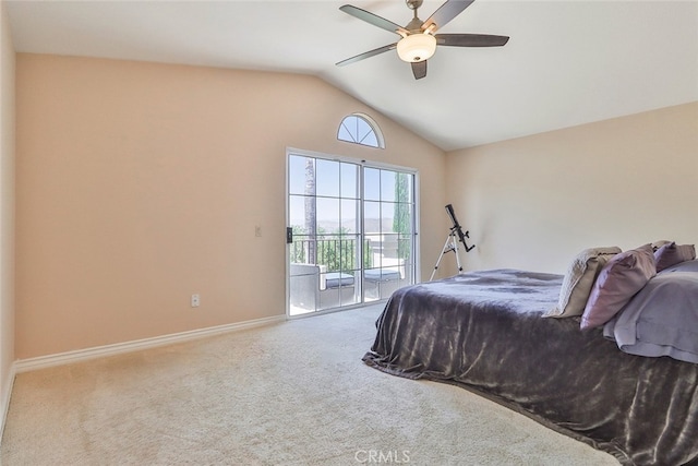 carpeted bedroom featuring vaulted ceiling, access to outside, and ceiling fan