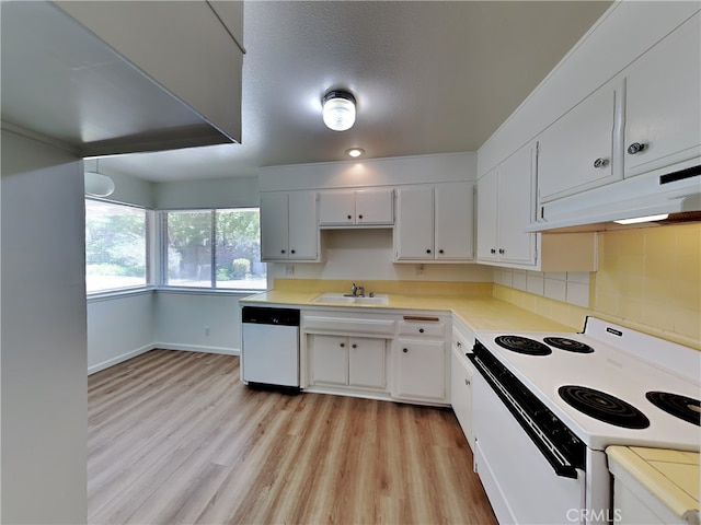 kitchen with white cabinets, dishwasher, white range with electric cooktop, sink, and light wood-type flooring