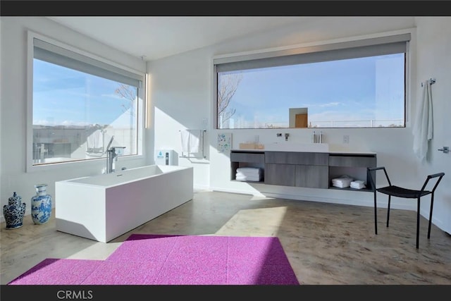 bathroom featuring concrete flooring