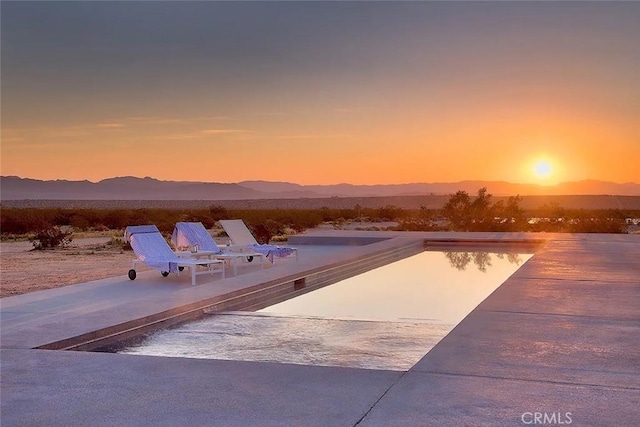 66028 Sonora Rd, Joshua Tree, CA 92252 - pool at dusk with a mountain view