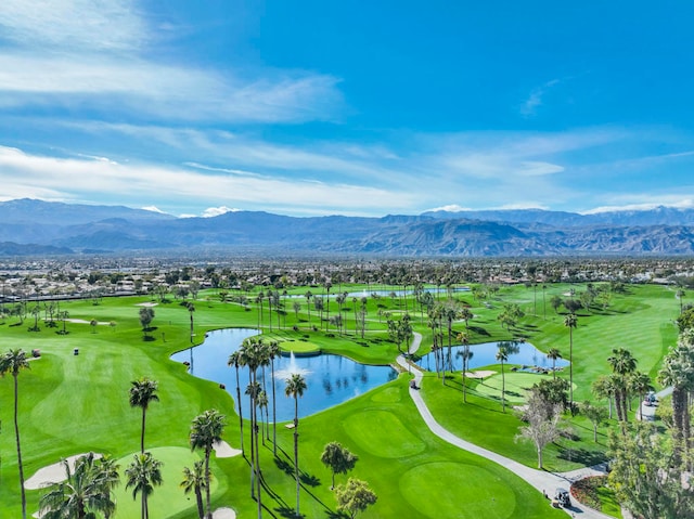 drone / aerial view featuring a water and mountain view