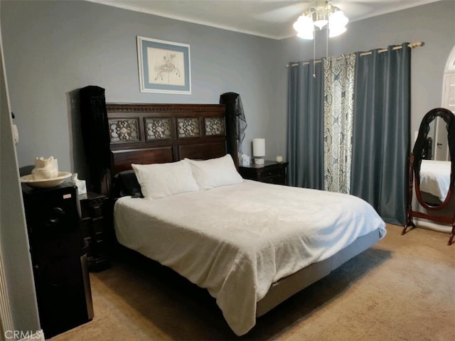 bedroom with ceiling fan and light colored carpet