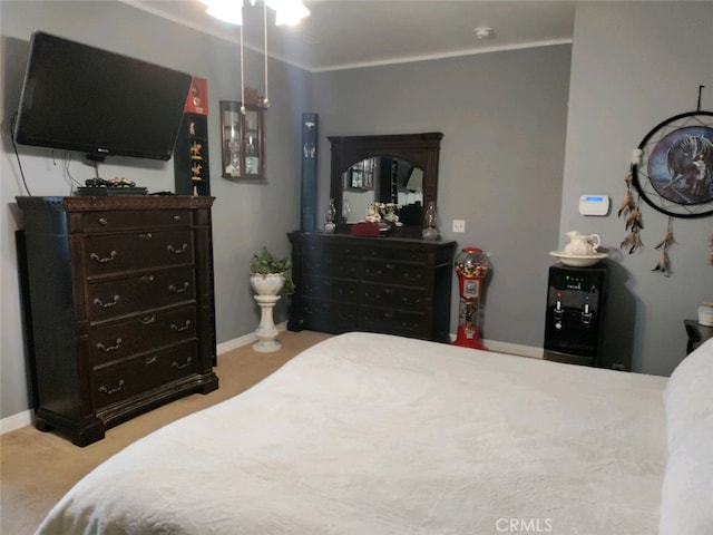 carpeted bedroom with crown molding