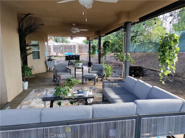 view of patio / terrace with ceiling fan and an outdoor hangout area