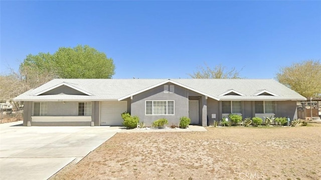 single story home featuring a garage