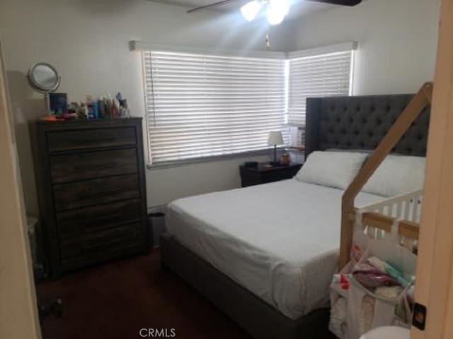 bedroom featuring ceiling fan