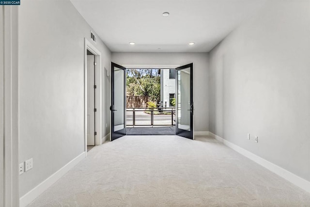 unfurnished room with carpet floors