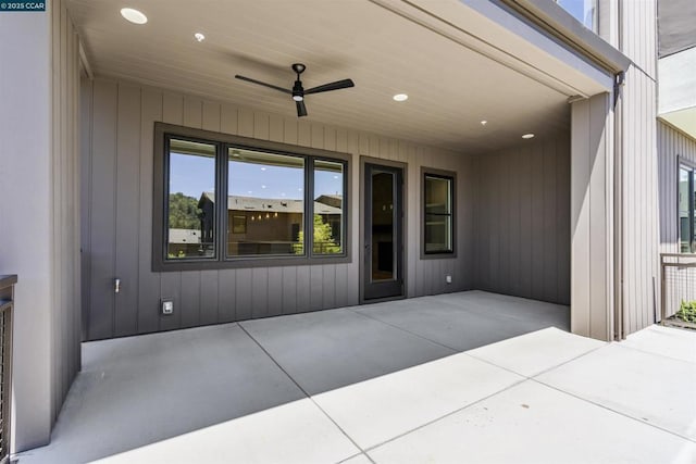 view of patio featuring ceiling fan