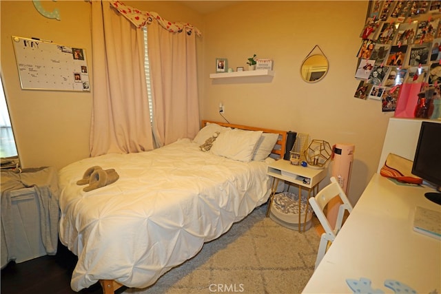 bedroom featuring carpet flooring