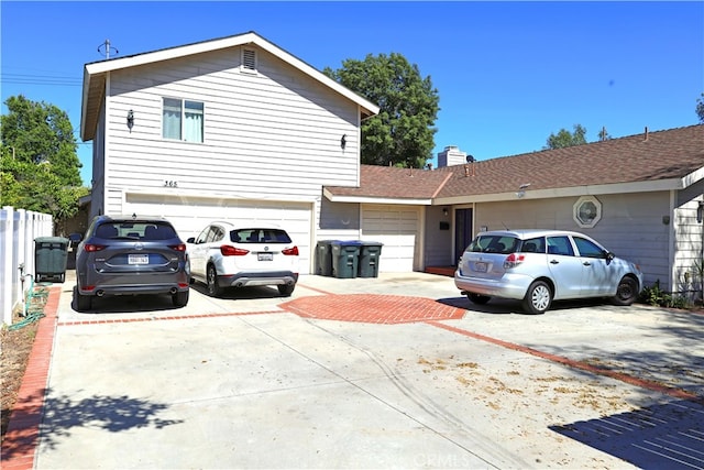 view of front of property featuring a garage