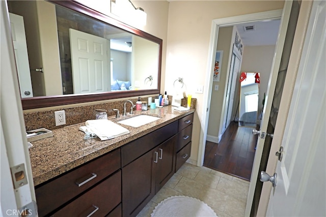 bathroom featuring vanity and tile patterned floors