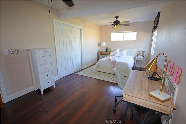 bedroom featuring ceiling fan, dark hardwood / wood-style flooring, and a closet