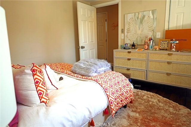 bedroom featuring hardwood / wood-style flooring