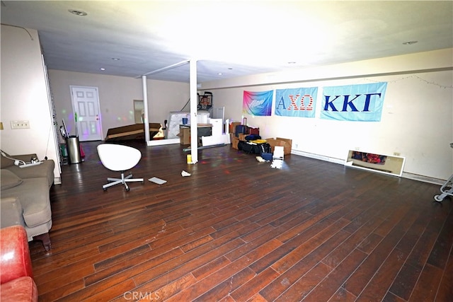 unfurnished office featuring dark hardwood / wood-style floors