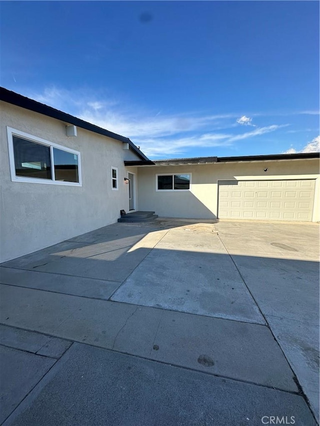 exterior space featuring a garage