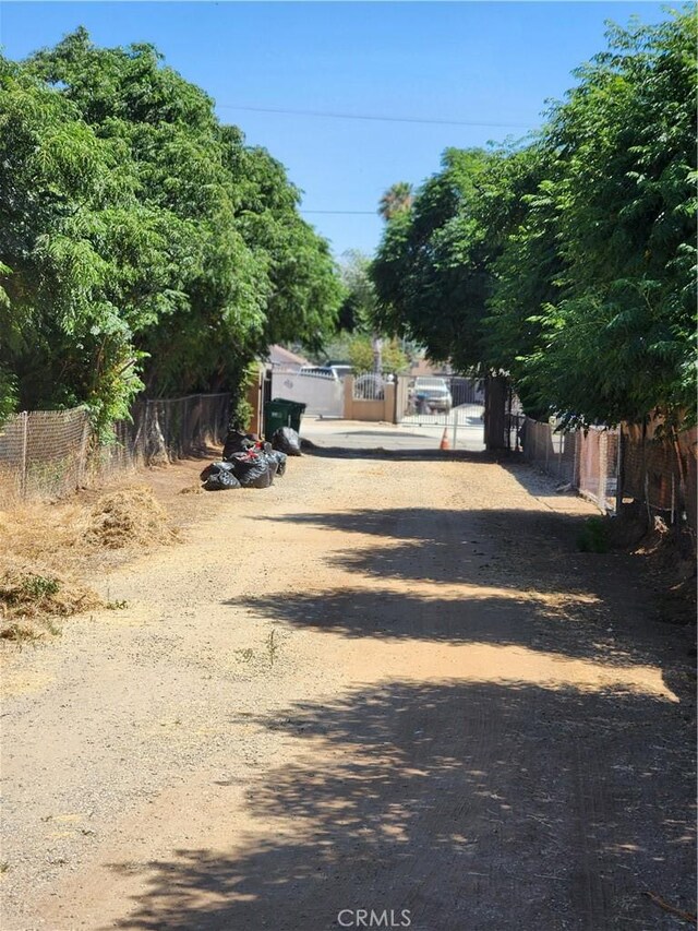 24062 Eucalyptus Ave, Moreno Valley, CA 92553 - view of road featuring a gate