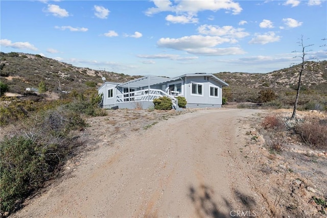 view of front of property featuring a mountain view