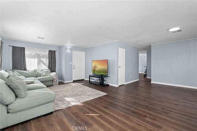 living room featuring dark wood-type flooring