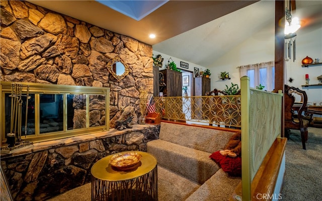 interior space with lofted ceiling and carpet flooring