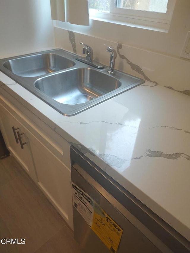 interior details with dishwashing machine and sink