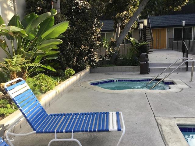 view of pool featuring a patio area