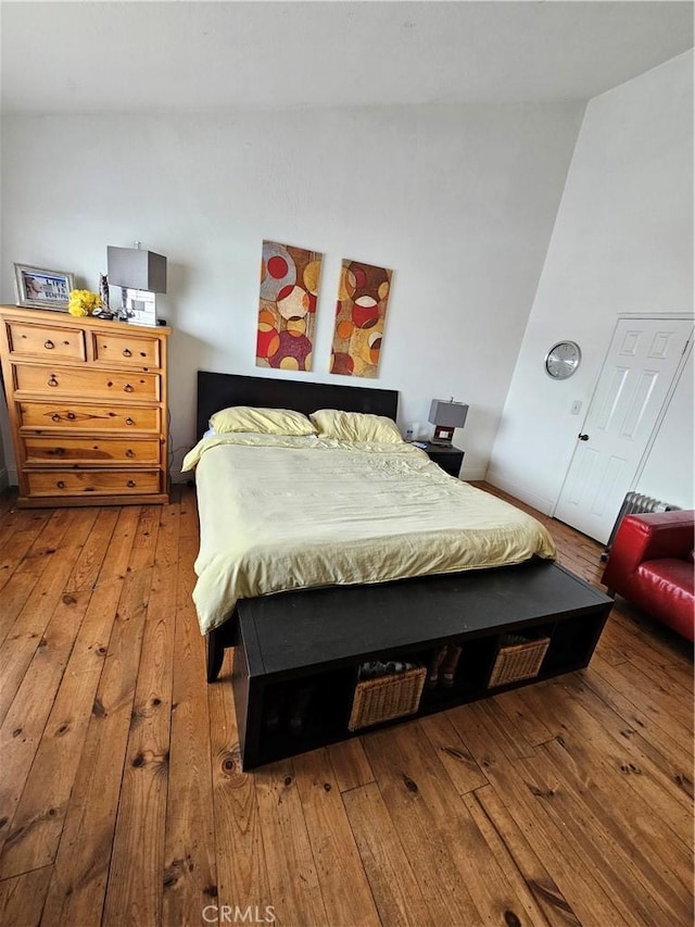 bedroom with light wood-type flooring