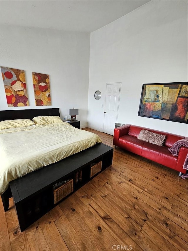 bedroom featuring wood-type flooring