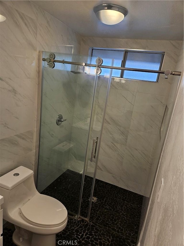 13921 Kornblum Unit 9, Hawthorne, CA 90250 - full bathroom featuring a shower stall and toilet