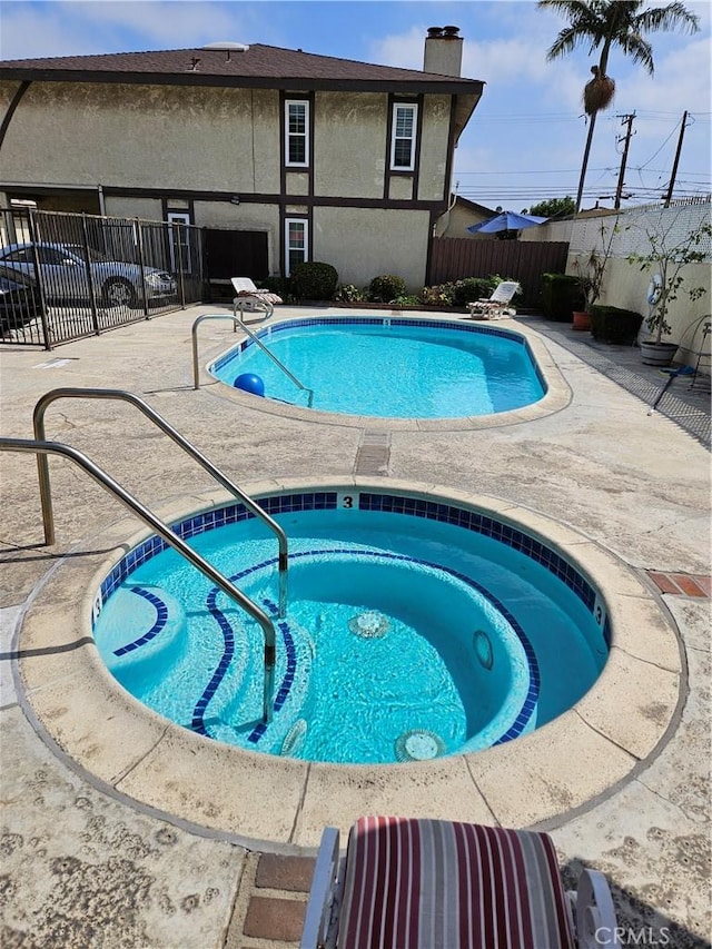 13921 Kornblum Unit 9, Hawthorne, CA 90250 - pool featuring fence, a patio area, and a community hot tub