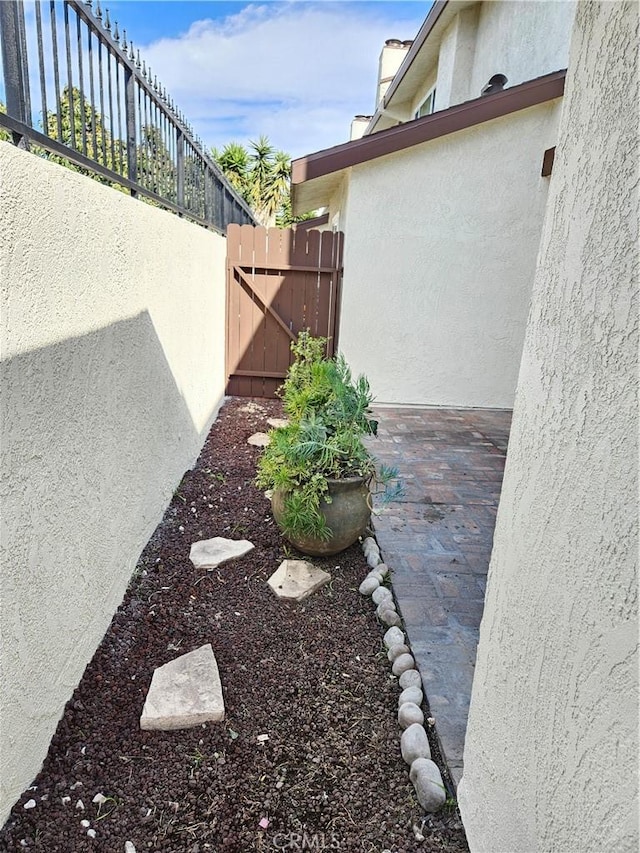 13921 Kornblum Unit 9, Hawthorne, CA 90250 - view of yard featuring fence and a gate