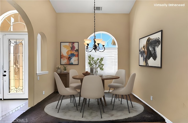 dining area with a notable chandelier