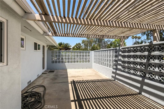 view of patio / terrace featuring a pergola