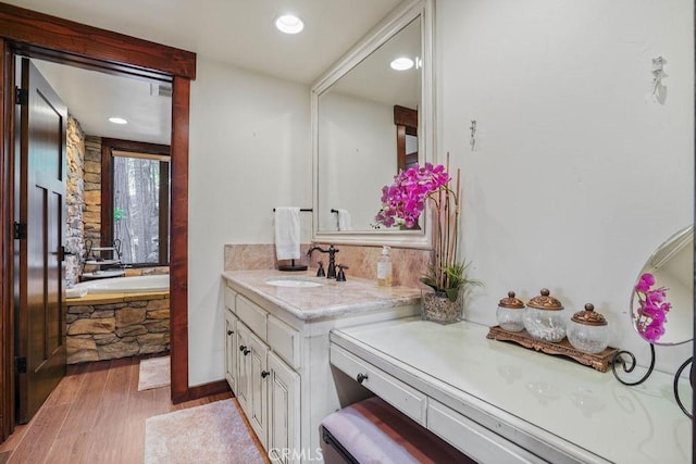 29130 Bald Eagle Rdg, Lake Arrowhead, CA 92352 - bathroom with vanity, hardwood / wood-style flooring, and a bathtub