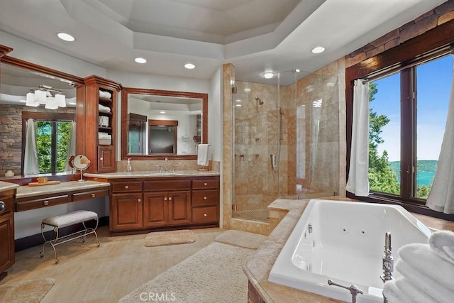 29130 Bald Eagle Rdg, Lake Arrowhead, CA 92352 - bathroom with a raised ceiling, plus walk in shower, hardwood / wood-style floors, and vanity