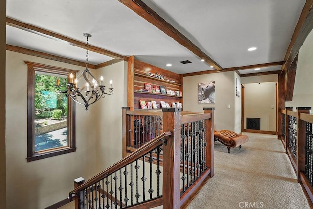 29130 Bald Eagle Rdg, Lake Arrowhead, CA 92352 - hallway featuring a chandelier, beam ceiling, and light carpet