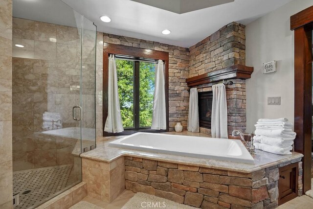 29130 Bald Eagle Rdg, Lake Arrowhead, CA 92352 - bathroom featuring shower with separate bathtub and tile patterned floors