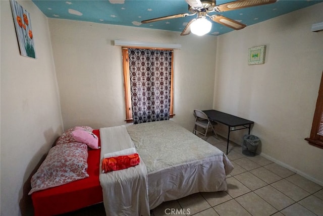 bedroom with light tile patterned flooring and ceiling fan