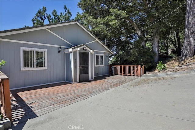 view of front of home featuring a wooden deck