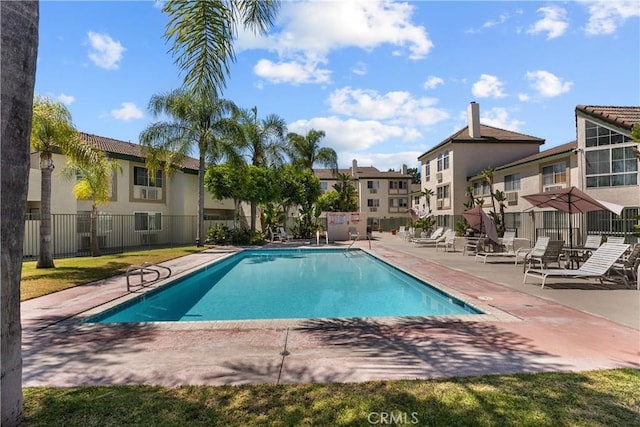 view of swimming pool featuring a patio area