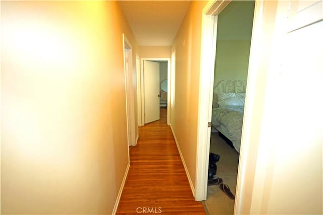 622 E Lomita Ave, Orange, CA 92867 - hall with baseboards and dark wood-style flooring