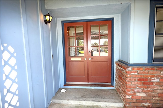 doorway to property featuring french doors